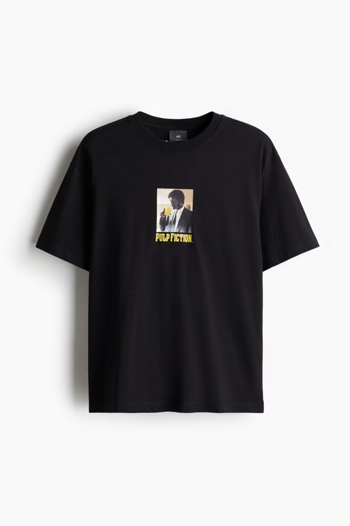 Black Pulp Fiction graphic t-shirt on hanger – clothing store in Kerala.